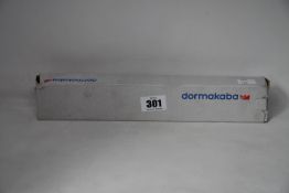 A boxed Dormakaba concealed fire door closer (PN: ITS 96).