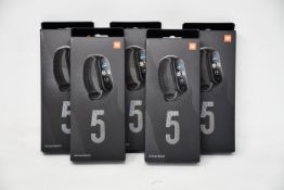 Five boxed as new Xiaomi Mi Smart Band 5 Fitness Trackers in black.