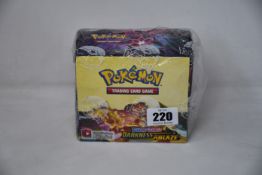 A sealed as new box of thirty six Pokemon Sword & Shield Darkness Ablaze expansion packs.