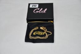 A boxed GLD Micro Cuban gold necklace with leather pouch (20