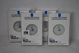Four boxed as new La Roche-Posay My Skin Track UV wearable sensors.
