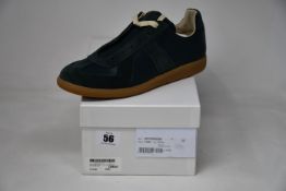A pair of as new Maison Margiela low top sneakers (EU 41.5).
