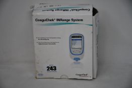 A boxed Roche coaguCheck INRange System for INR testing (Some damage to outer box).