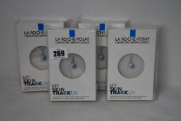 Four boxed as new La Roche-Posay My Skin Track UV wearable sensors.
