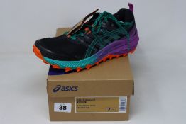 A pair of women's as new Asics Gel-Trabuco 9 trainers (UK 5).