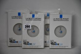 Four boxed as new La Roche-Posay My Skin Track UV wearable sensors.