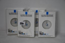 Four boxed as new La Roche-Posay My Skin Track UV wearable sensors.