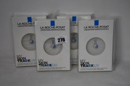 Four boxed as new La Roche-Posay My Skin Track UV wearable sensors.