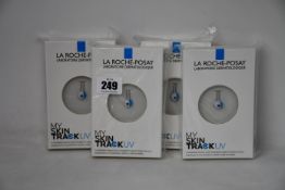 Four boxed as new La Roche-Posay My Skin Track UV wearable sensors.