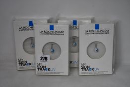 Four boxed as new La Roche-Posay My Skin Track UV wearable sensors.