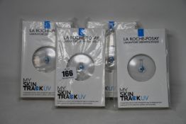 Four boxed as new La Roche-Posay My Skin Track UV wearable sensors.