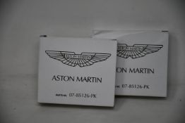 Two boxes of four as new Aston Martin spark plugs 07-85126-PK.