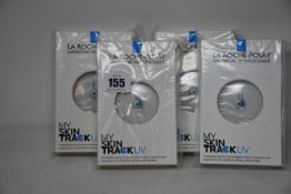 Four boxed as new La Roche-Posay My Skin Track UV wearable sensors.