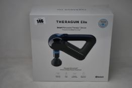 A boxed as new Theragun Elite smart deep tissue massage device.