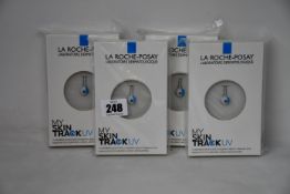 Four boxed as new La Roche-Posay My Skin Track UV wearable sensors.