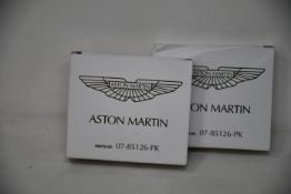 Two boxes of four as new Aston Martin spark plugs 07-85126-PK.