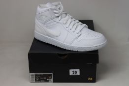 A pair of as new Nike Air Jordan Mid (UK 11).