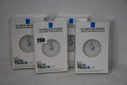 Four boxed as new La Roche-Posay My Skin Track UV wearable sensors.