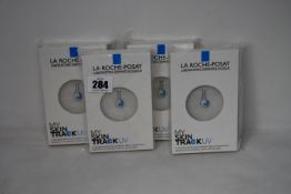 Four boxed as new La Roche-Posay My Skin Track UV wearable sensors.