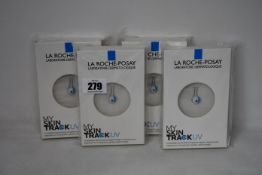 Four boxed as new La Roche-Posay My Skin Track UV wearable sensors.