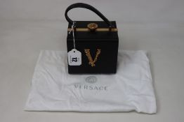 An as new Versace Virtus square handbag (RRP £1,770).