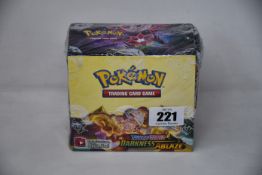 A sealed as new box of thirty six Pokemon Sword & Shield Darkness Ablaze expansion packs.