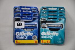 Four Gillette Mach 3 (8 pack razor blades) and four Gillette Mach 3 Turbo (8 pack razor blades).