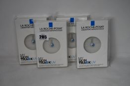 Four boxed as new La Roche-Posay My Skin Track UV wearable sensors.