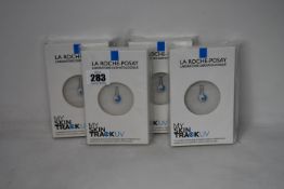 Four boxed as new La Roche-Posay My Skin Track UV wearable sensors.