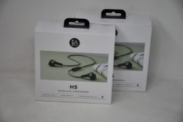 Two as new boxed and sealed Bang & Olsen moss green Beoplay H5 wireless earphones (SN31089925).