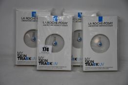 Four boxed as new La Roche-Posay My Skin Track UV wearable sensors.
