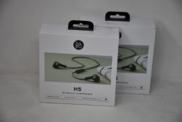 Two as new boxed and sealed Bang & Olsen moss green Beoplay H5 wireless earphones (SN31089925).