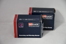 Two boxed as new Brigade reversing and warning alarms for vehicles.