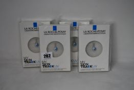 Four boxed as new La Roche-Posay My Skin Track UV wearable sensors.