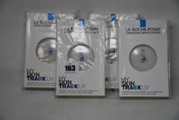 Four boxed as new La Roche-Posay My Skin Track UV wearable sensors.