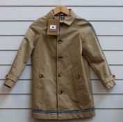 A children's as new Burberry trench coat (8 years - RRP £220).