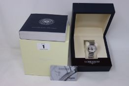 A ladies boxed as new Longines PrimaLuna 30mm watch in silver (RRP £1190).