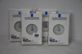 Four boxed as new La Roche-Posay My Skin Track UV wearable sensors.