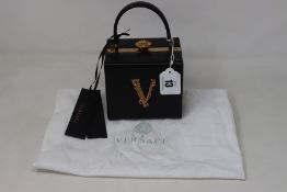 An as new Versace Virtus square handbag (RRP £1,770).