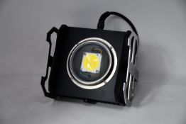 A boxed Migrolight - Migro Veg single LED grow light.