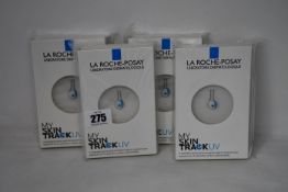 Four boxed as new La Roche-Posay My Skin Track UV wearable sensors.