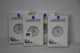 Four boxed as new La Roche-Posay My Skin Track UV wearable sensors.