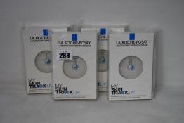 Four boxed as new La Roche-Posay My Skin Track UV wearable sensors.
