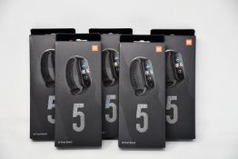 Five boxed as new Xiaomi Mi Smart Band 5 Fitness Trackers in black.