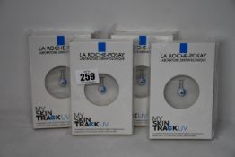 Four boxed as new La Roche-Posay My Skin Track UV wearable sensors.