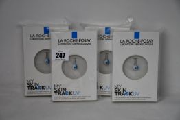 Four boxed as new La Roche-Posay My Skin Track UV wearable sensors.