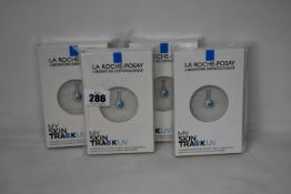 Four boxed as new La Roche-Posay My Skin Track UV wearable sensors.
