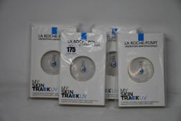 Four boxed as new La Roche-Posay My Skin Track UV wearable sensors.