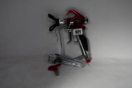 An as new Titan RX-paint sprayer gun (PN: L295AB) in red.