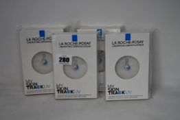 Four boxed as new La Roche-Posay My Skin Track UV wearable sensors.